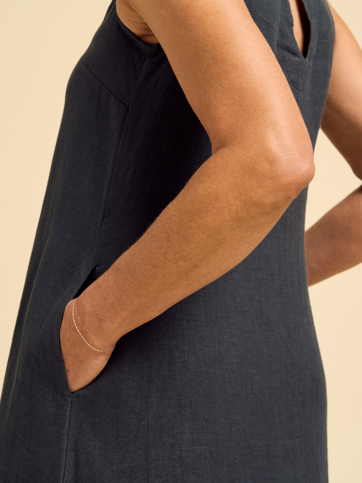 Model wears Peony Linen Dress in Charcoal