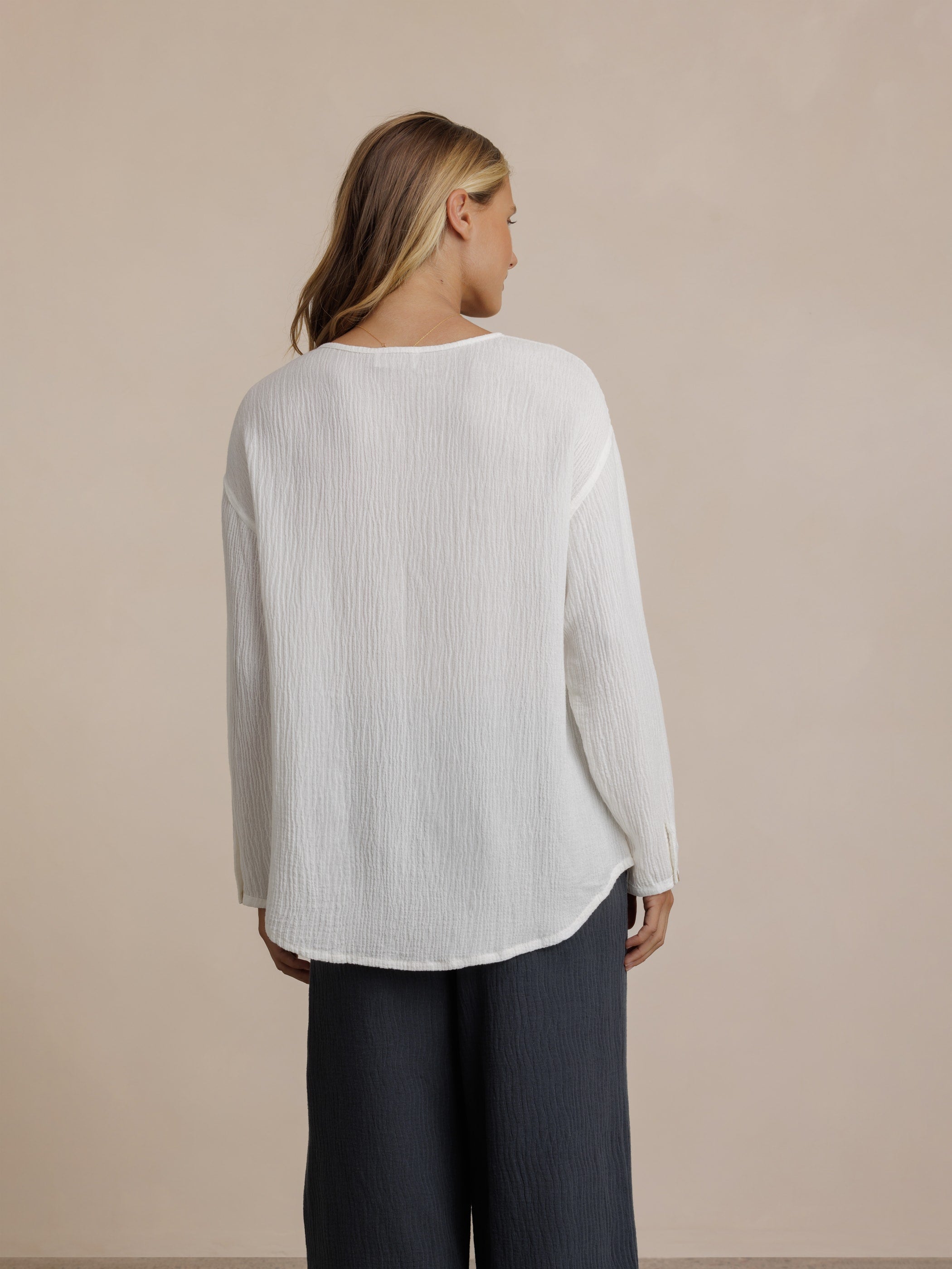 Model wears La Vie Linen Blend Blouse in Coconut