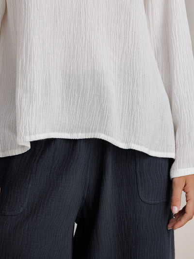 Model wears La Vie Linen Blend Blouse in Coconut