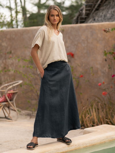 Model wears Soraya Linen Skirt in Charcoal