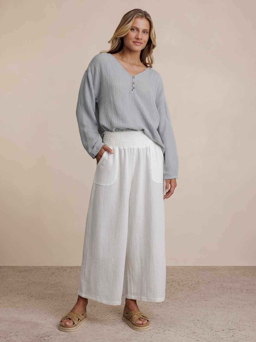 Model wears Bahama 3/4 Cotton Pants in Coconut
