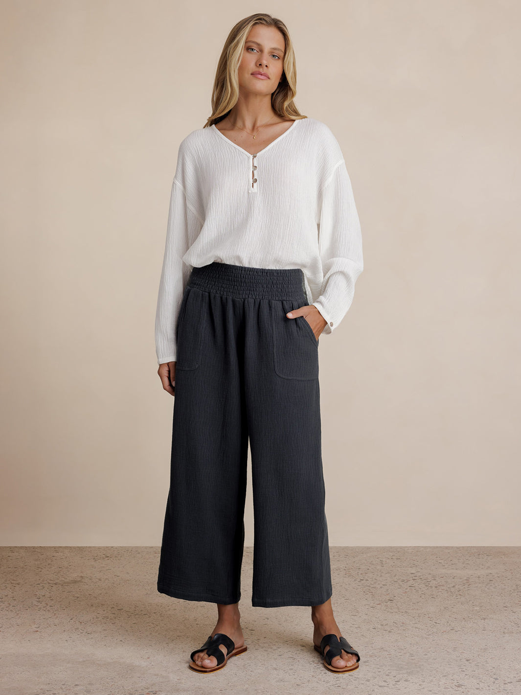 Model wears Bahama 3/4 Cotton Pants in Charcoal.