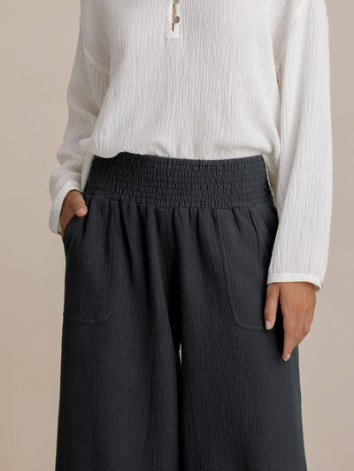 Model wears Bahama 3/4 Cotton Pants in Charcoal.