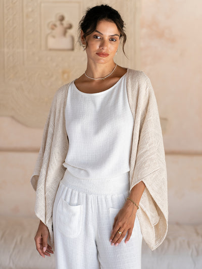 Model wears Bloom Cotton Shrug in Ecru