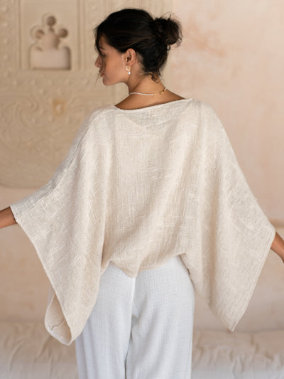 Model wears Bloom Cotton Shrug in Ecru