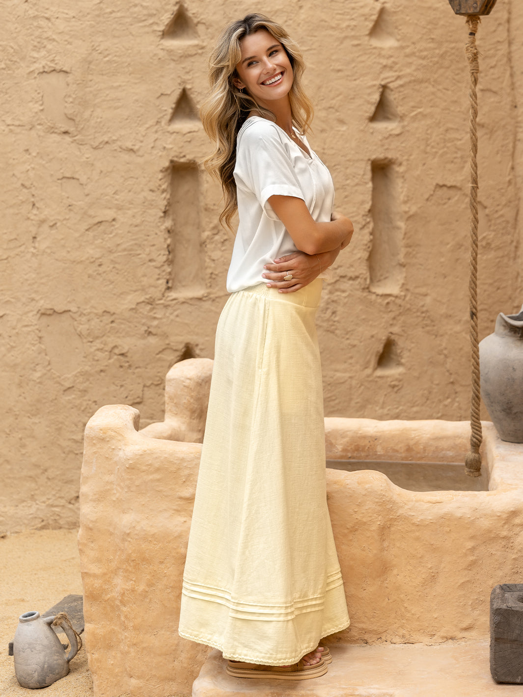 Model wears Bordeaux Cotton Skirt in Lemon