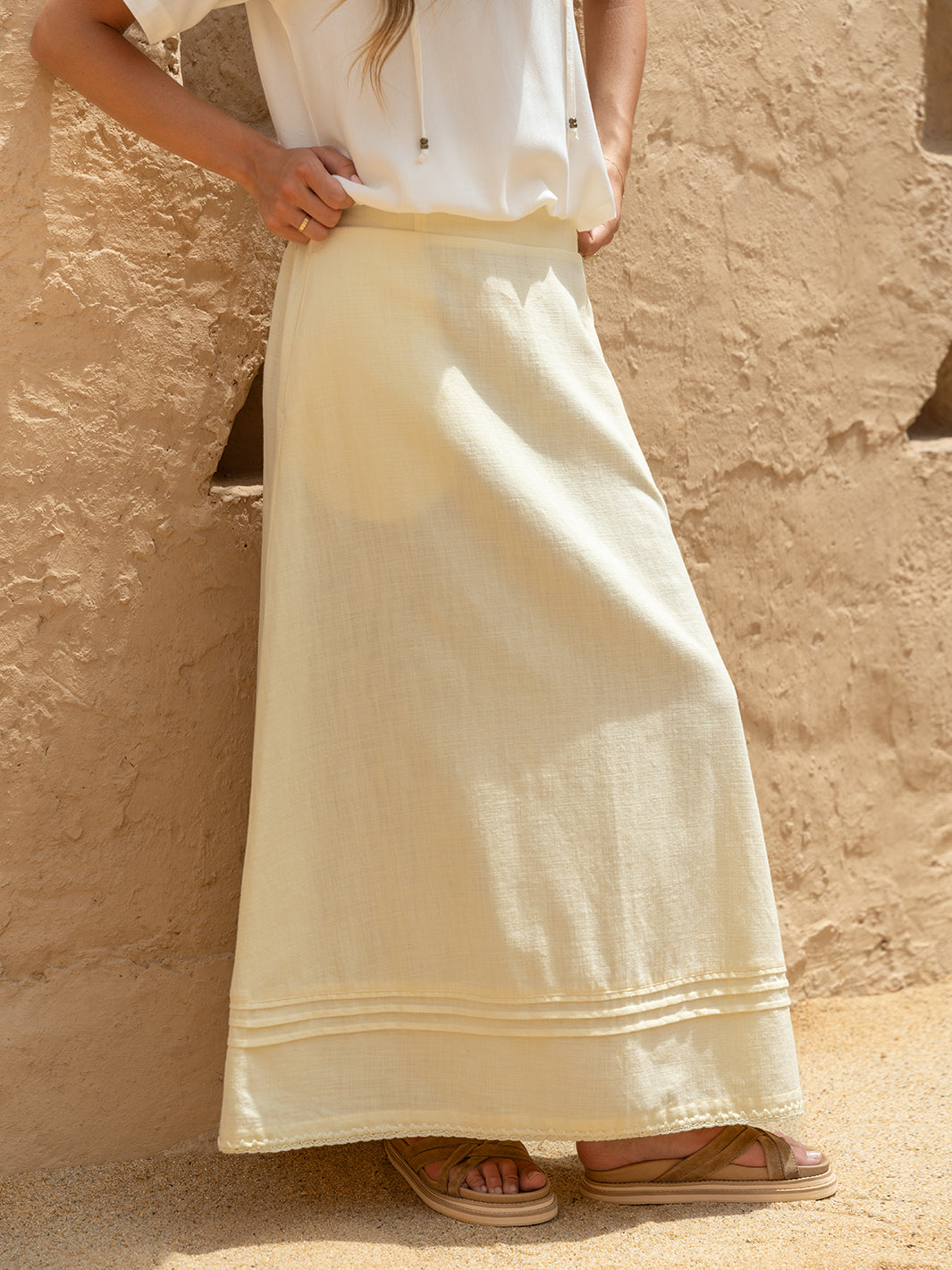 Model wears Bordeaux Cotton Skirt in Lemon