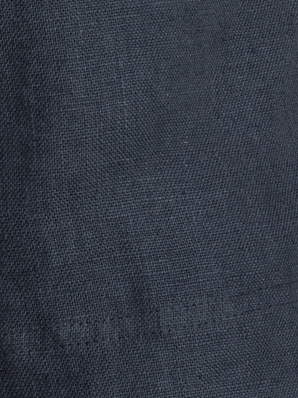 Image features fabric swatches of Dahlia Linen Shorts in Charcoal