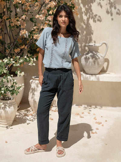 Model wears Daisy Organic Cotton Blouse Slate Blue