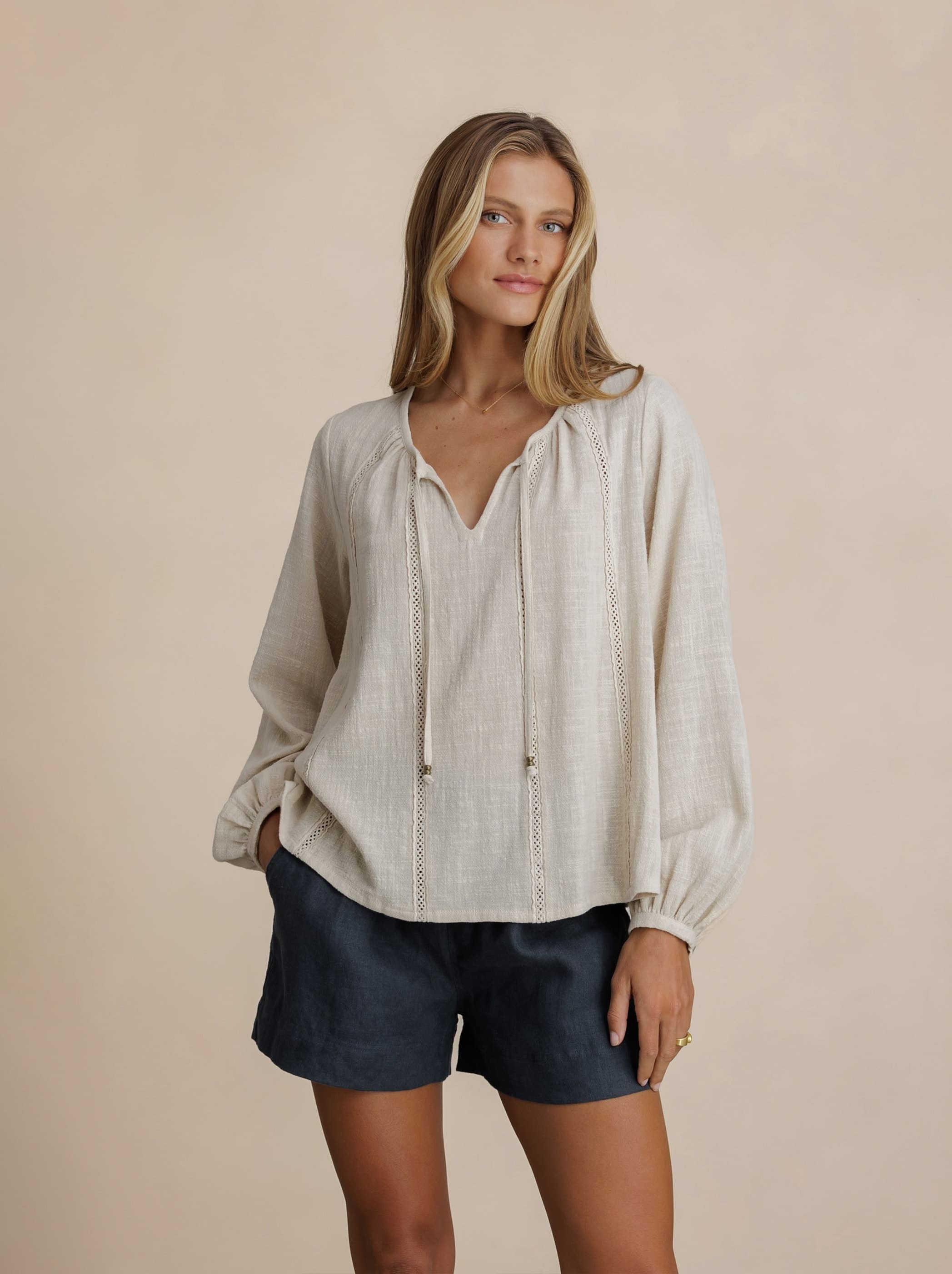 Model wears Jasmine Cotton Blouse in Stone