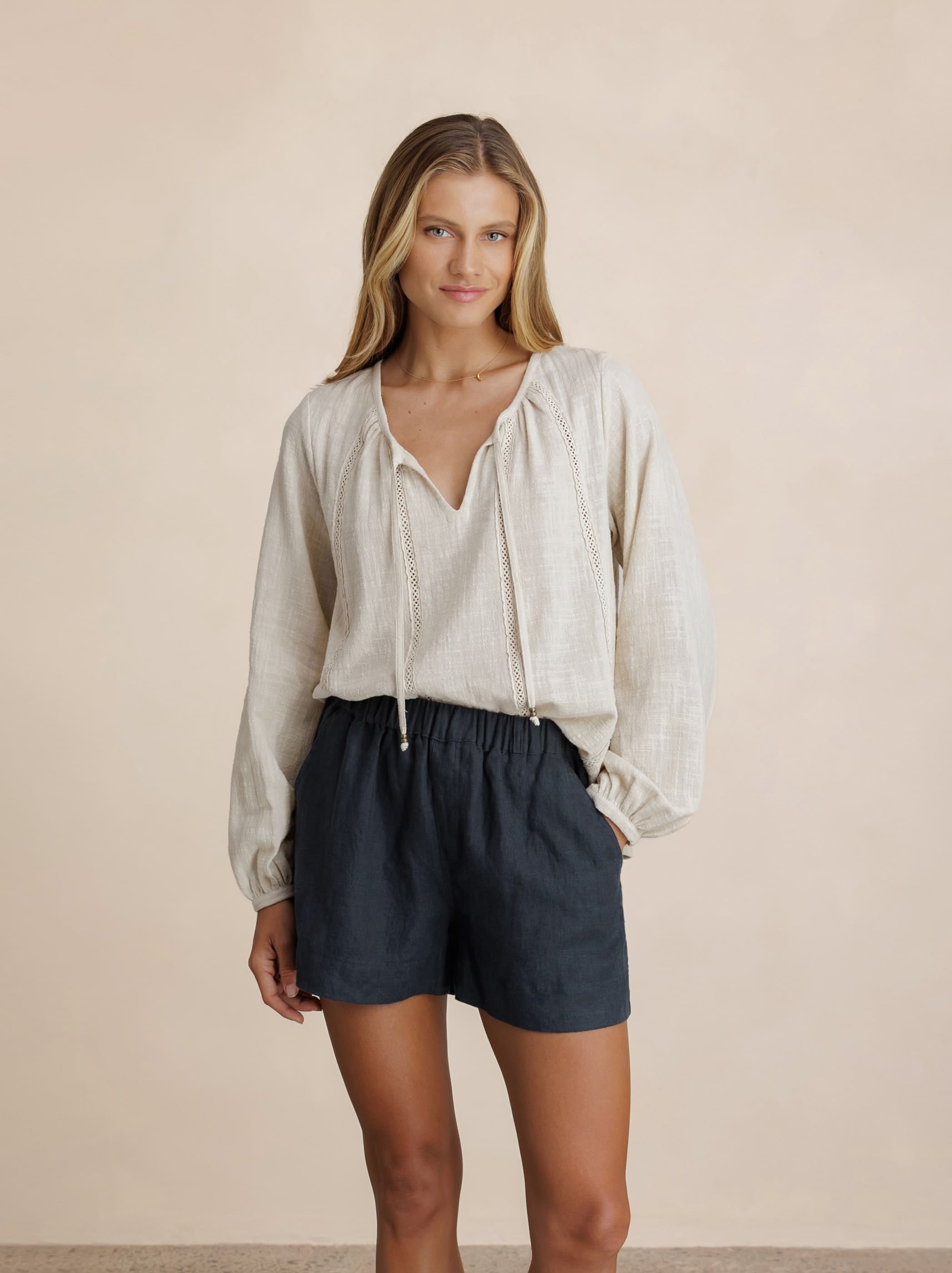 Model wears Jasmine Cotton Blouse in Stone