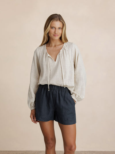 Model wears Jasmine Cotton Blouse in Stone