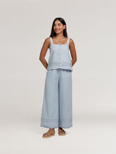 Model wears Cassia Cotton Top & Carabella Cotton Pants in Slate Blue