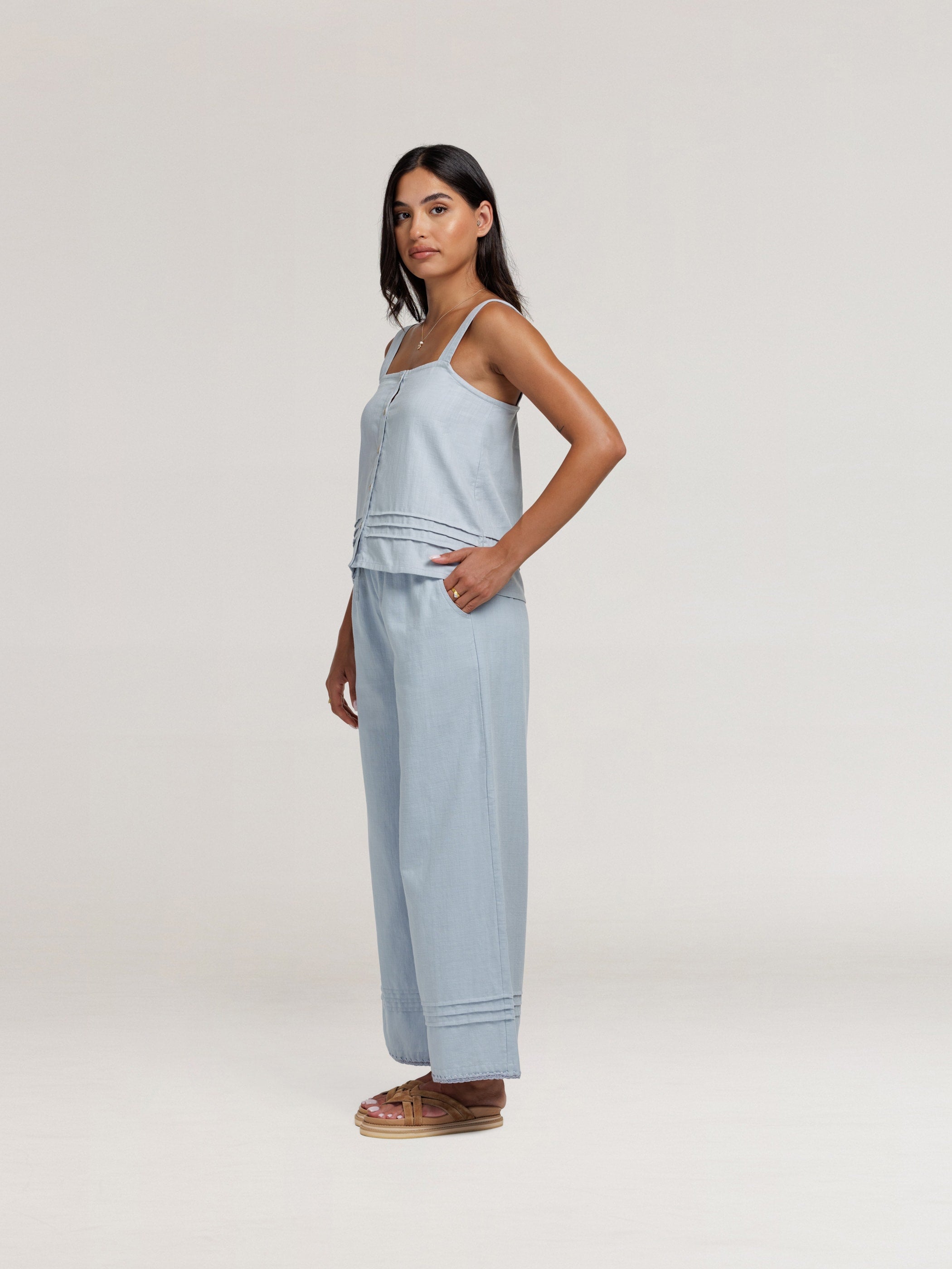 Model wears Cassia Cotton Top & Carabella Cotton Pants in Slate Blue