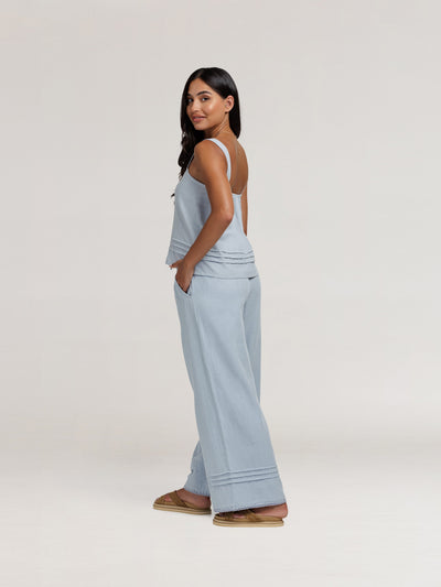 Model wears Cassia Cotton Top & Carabella Cotton Pants in Slate Blue