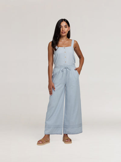 Model wears Carabella Cotton Pants in Slate Blue
