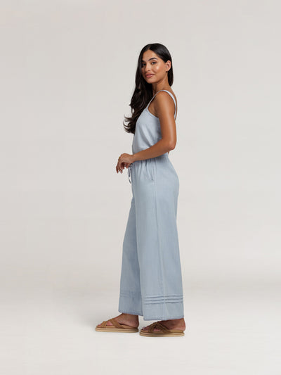 Model wears Carabella Cotton Pants in Slate Blue