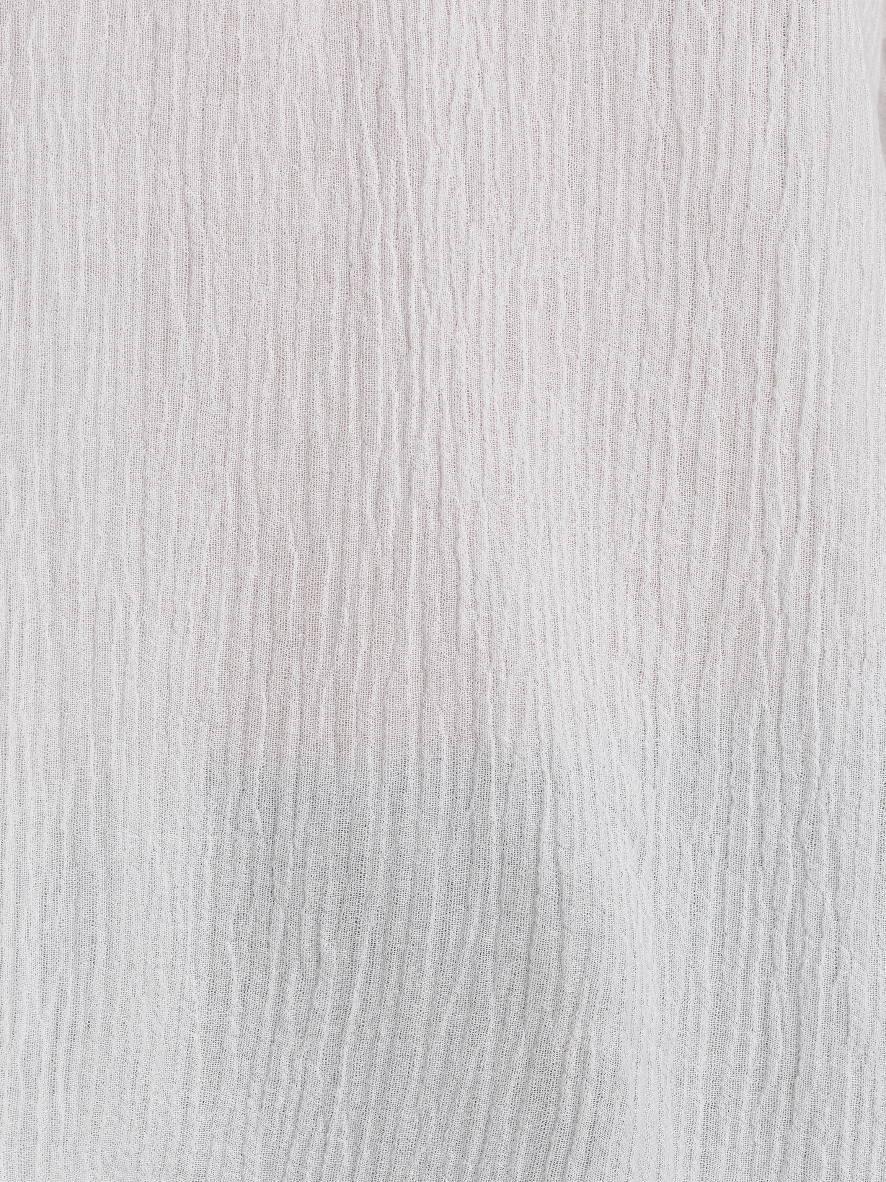 Image features fabric swatch of La Vie Linen Blend Blouse in Coconut