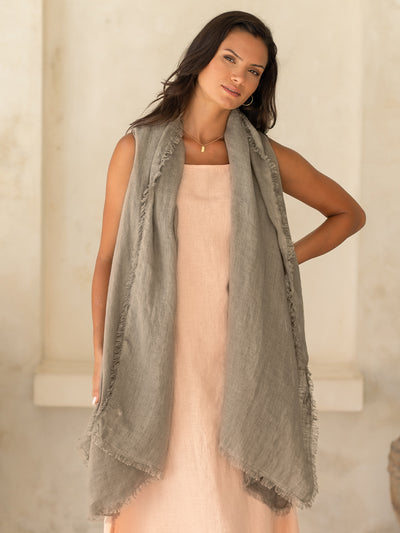Model wears Lumi Linen Scarf in Taupe