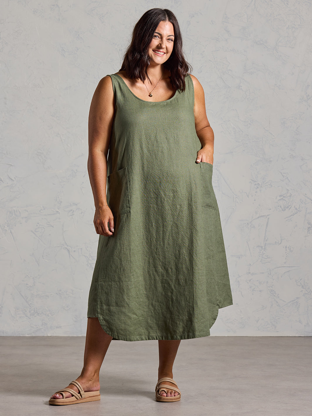 Model wearing Laurel French Linen Dress in Olive colour