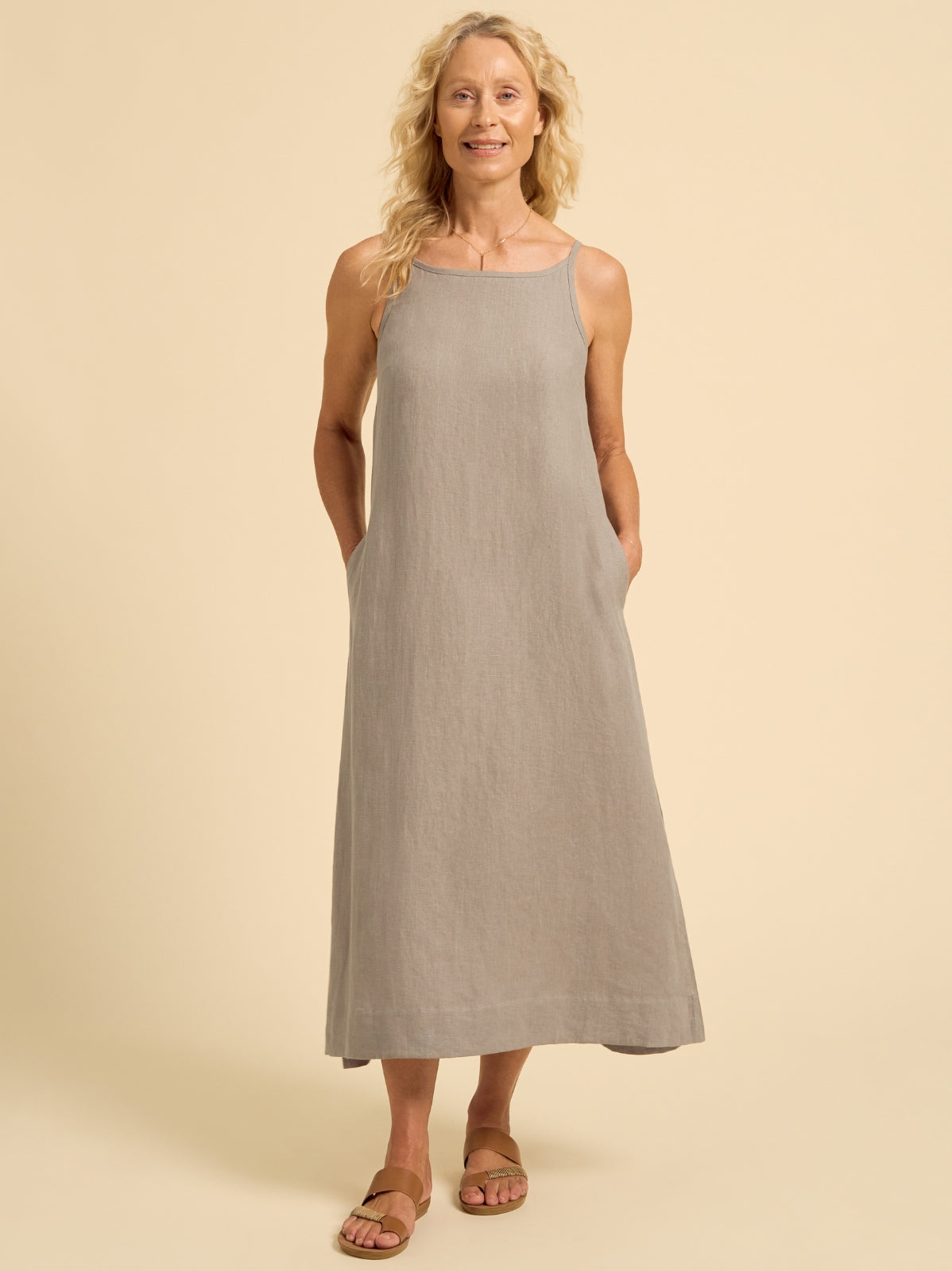 Model wears Peony Linen Dress in Taupe