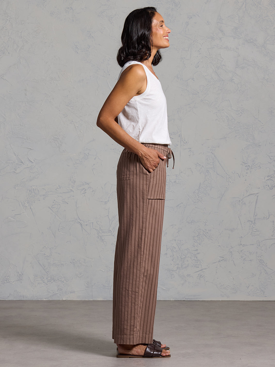 Woman wearing Sidari Organic Cotton Pants Cinnamon from Nomad the Label