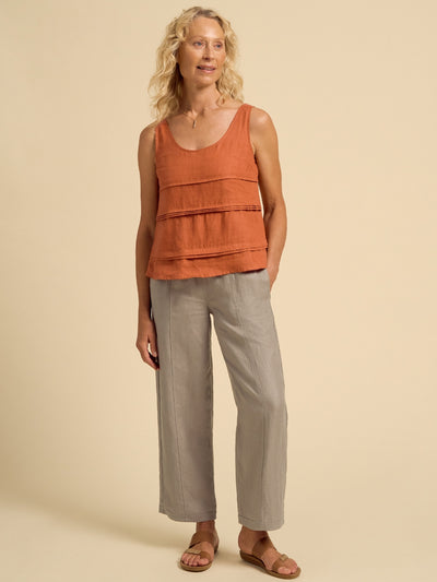Model wears Stella Linen Top in Rust