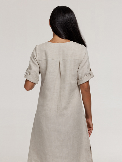 Model wears Elyse French Linen Midi Dress in Flax
