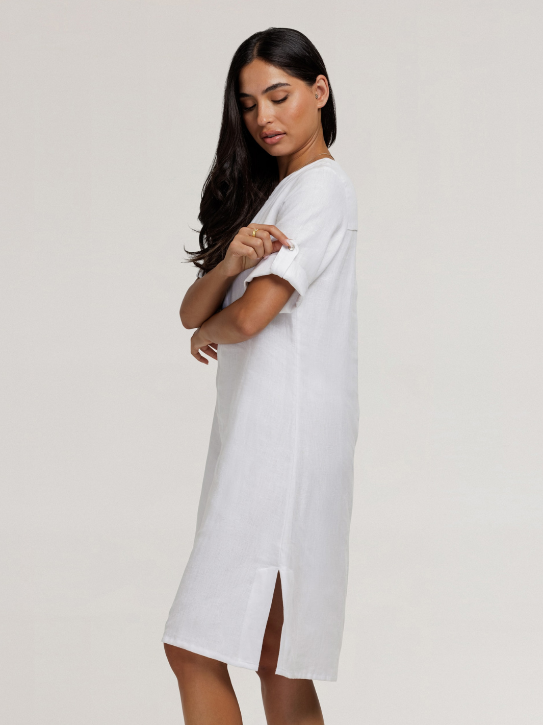 Model wears Elyse French Linen Midi Dress in White