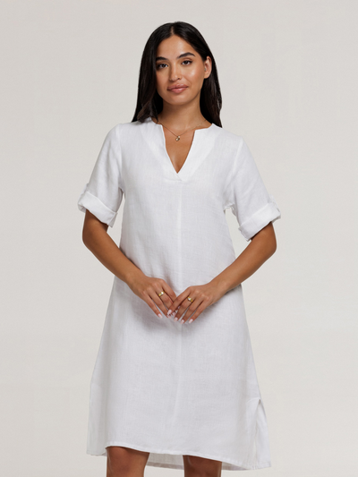 Model wears Elyse French Linen Midi Dress in White