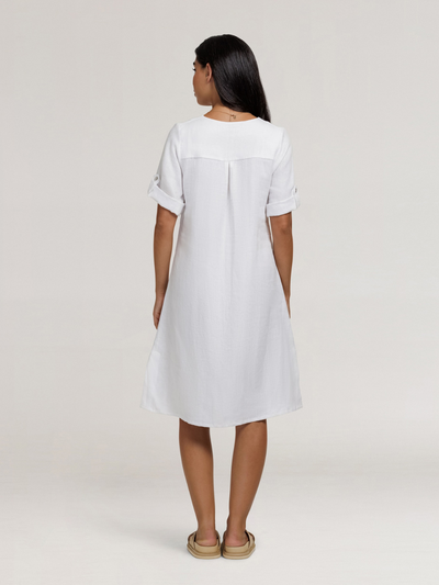 Model wears Elyse French Linen Midi Dress in White