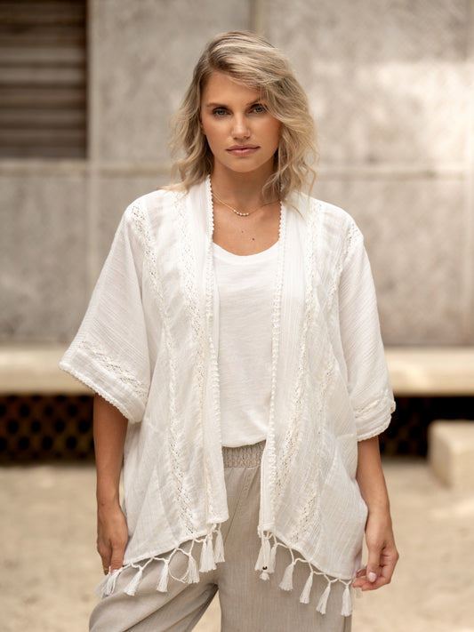Woman wearing the Solaris Cotton Kimono Coconut from Nomad the Label